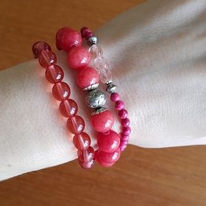 Set of three red bracelets